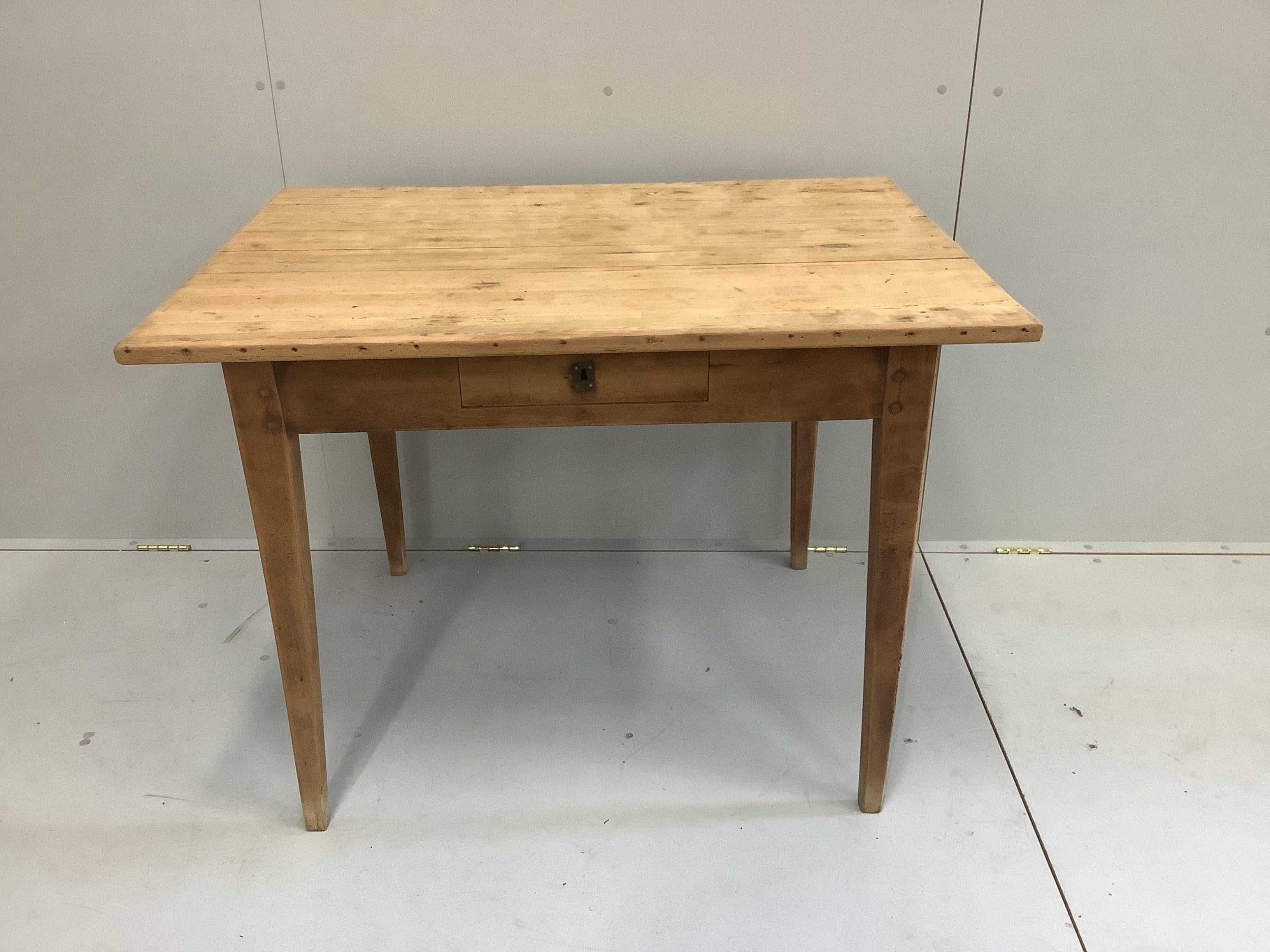 A French pine side table with frieze drawer, width 105cm, depth 79cm, height 76cm
